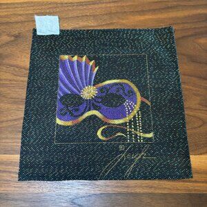 Needlepoint canvas, NWOT, of masquerade mask with vibrant colors.